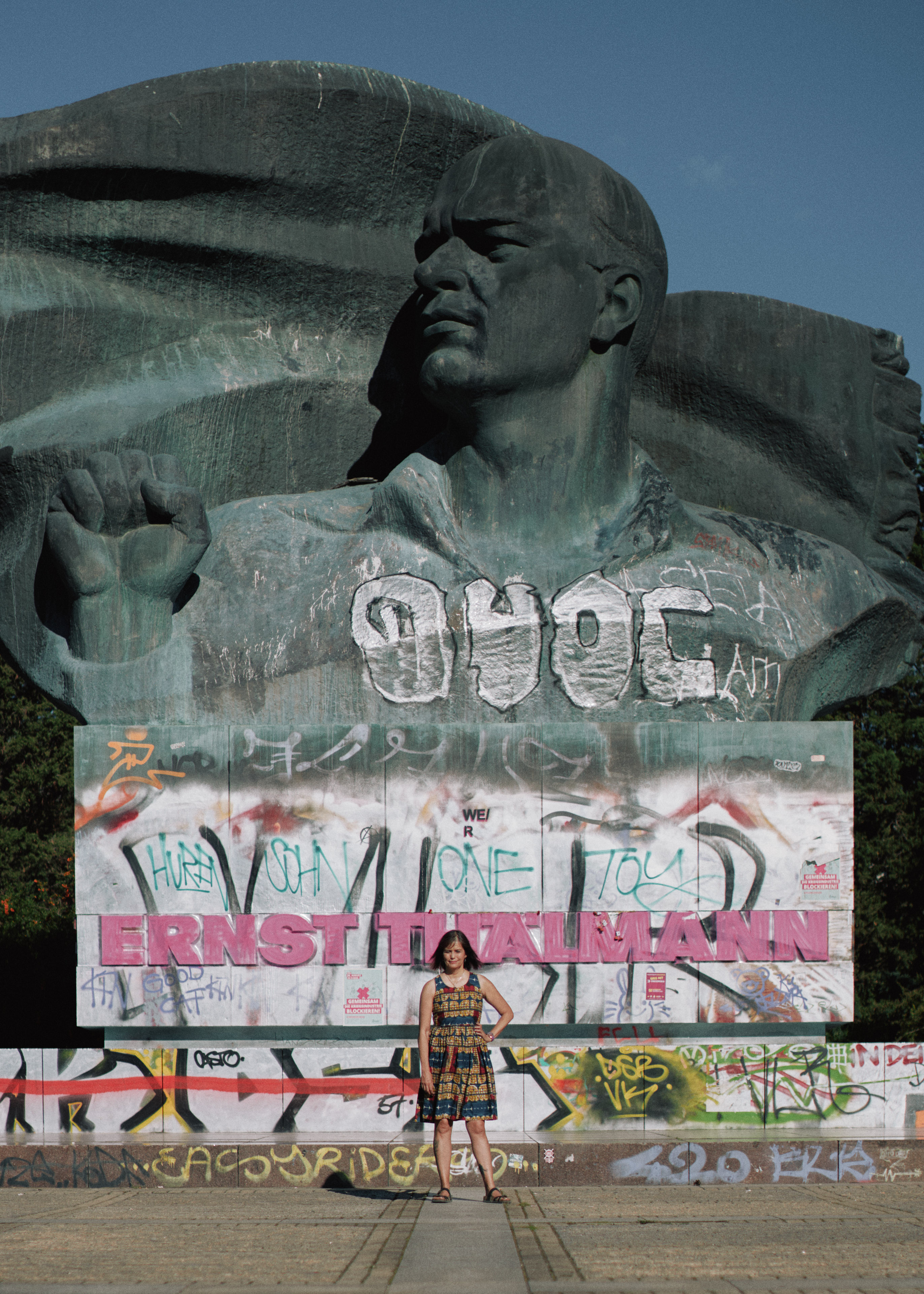 Maria in front of a monument to Ernst Thälmann