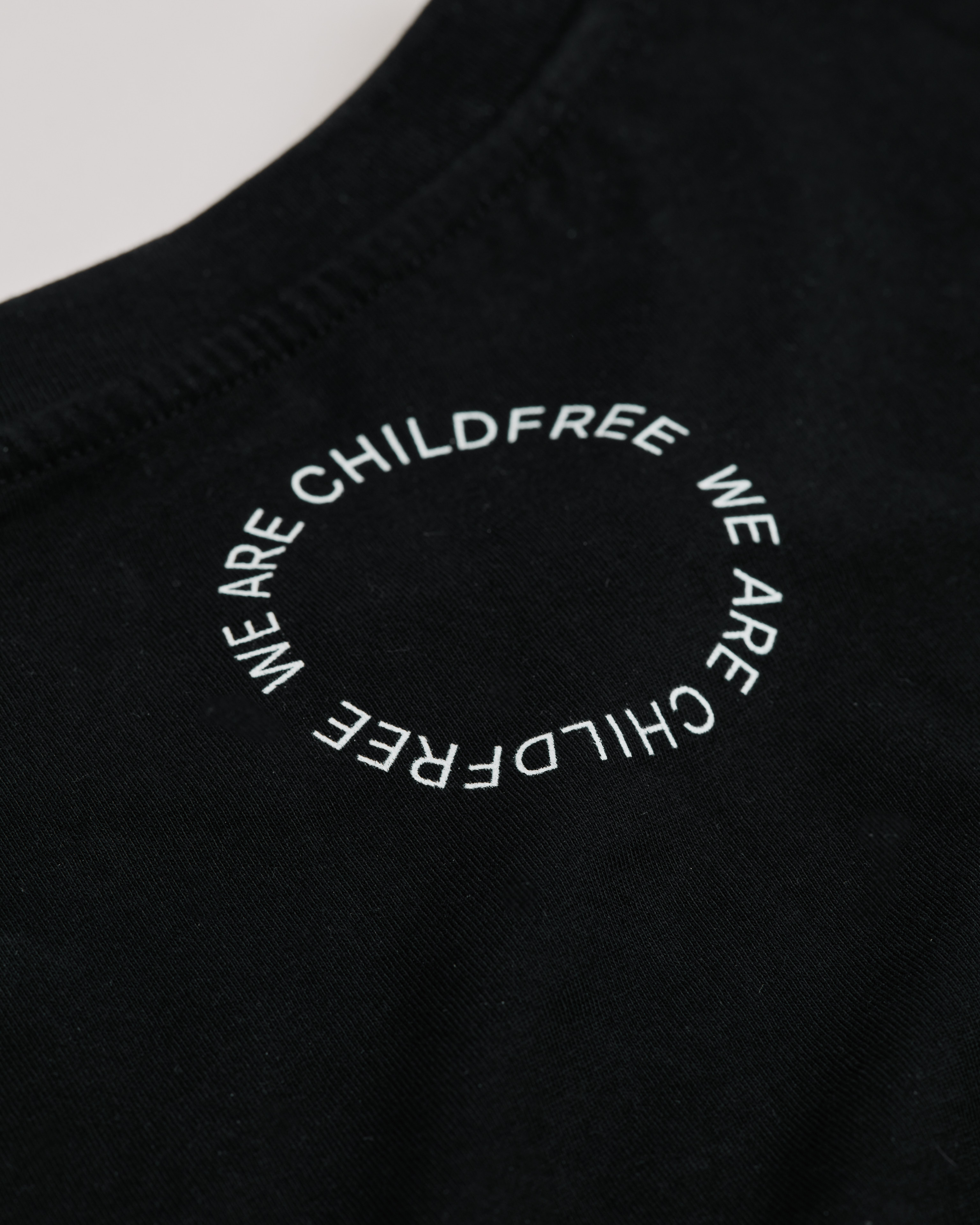 Close-up black We are Childfree t-shirt back detail