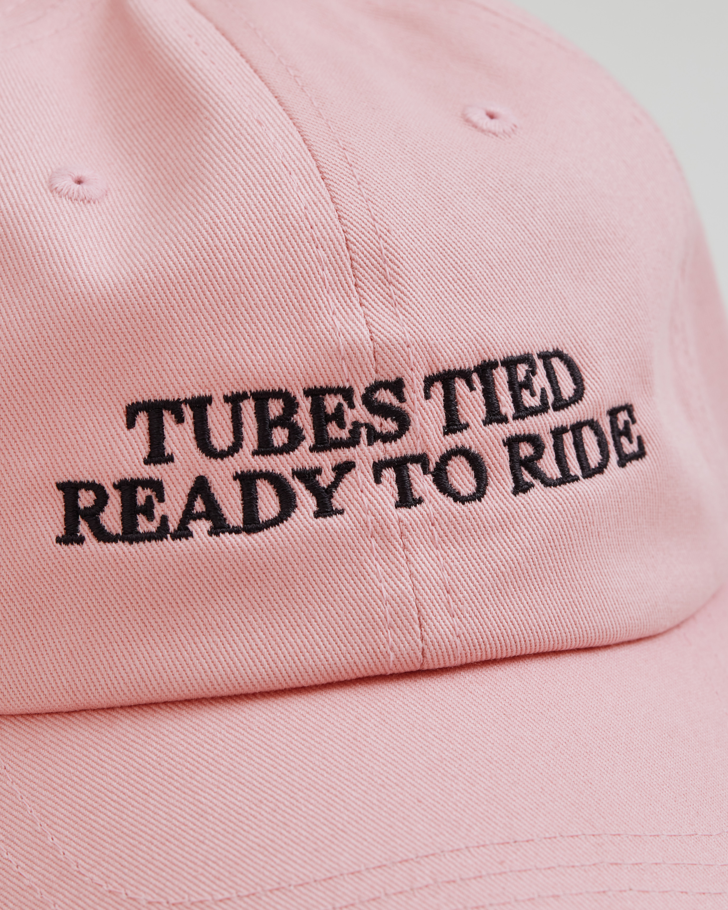 Tubes Tied Ready to Ride dad cap pink close-up