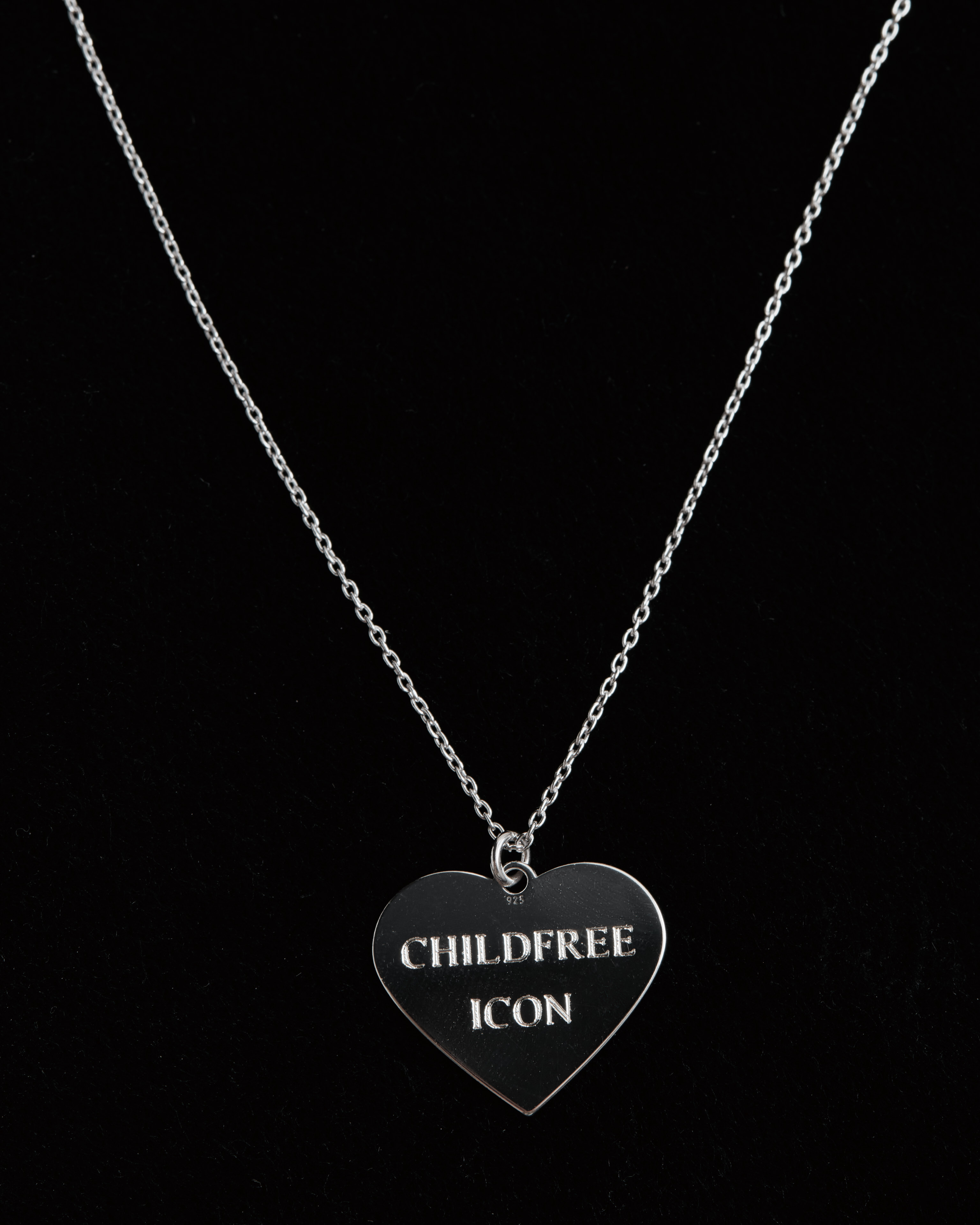 Childfree Icon Member Exclusive engraved silver heart necklace close-up